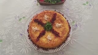 طرز تهیه ته چین زعفرانی ساده با نارگل