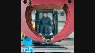 بیل مکانیکی و ساندویچ سوسیس