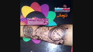تاتو نقشه و قطب نما روی ساعد دست