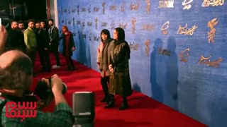 فرش قرمز پالتو شتری