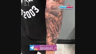 تتو فرشته و گل روی ساعد