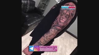 تتو شیر و چشم روی بازو و ساعد
