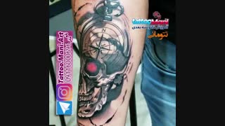 تاتو قطبنما و جمجمه روی ساعد و بازو