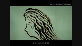 she is in the rain/the rose