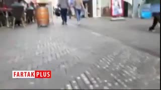 سکه ایرانی در سنگفرش خیابانی در لاهه هلند