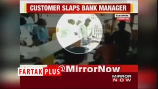 لحظه سیلی زدن مشتری به کارمند بانک!